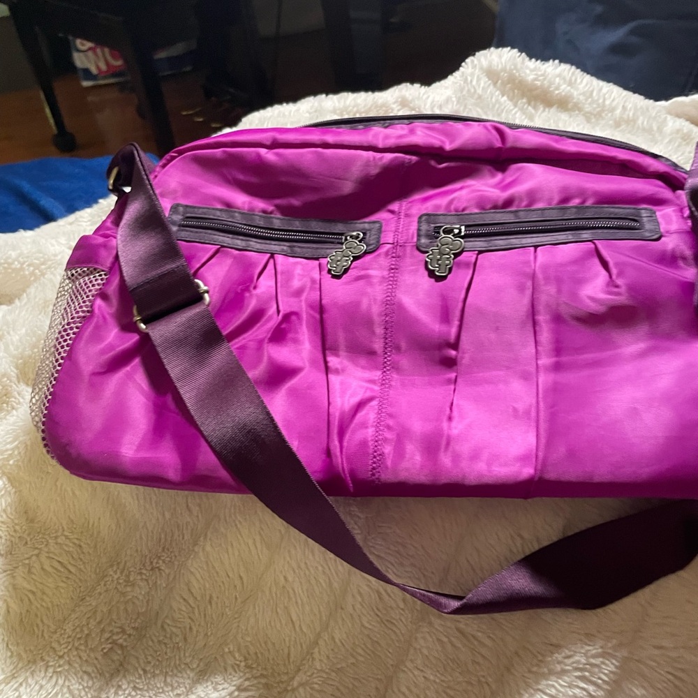 Triple Flip purple athletic bag